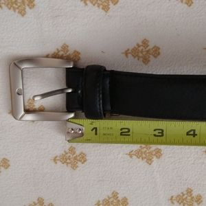 Belt, black with silver buckle, 56 inches long NWOT